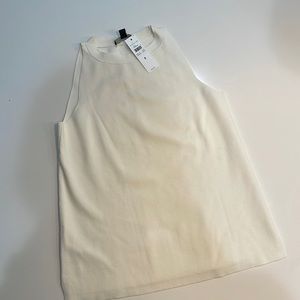 Ann Taylor sleeveless knit sweater, size small. Ivory